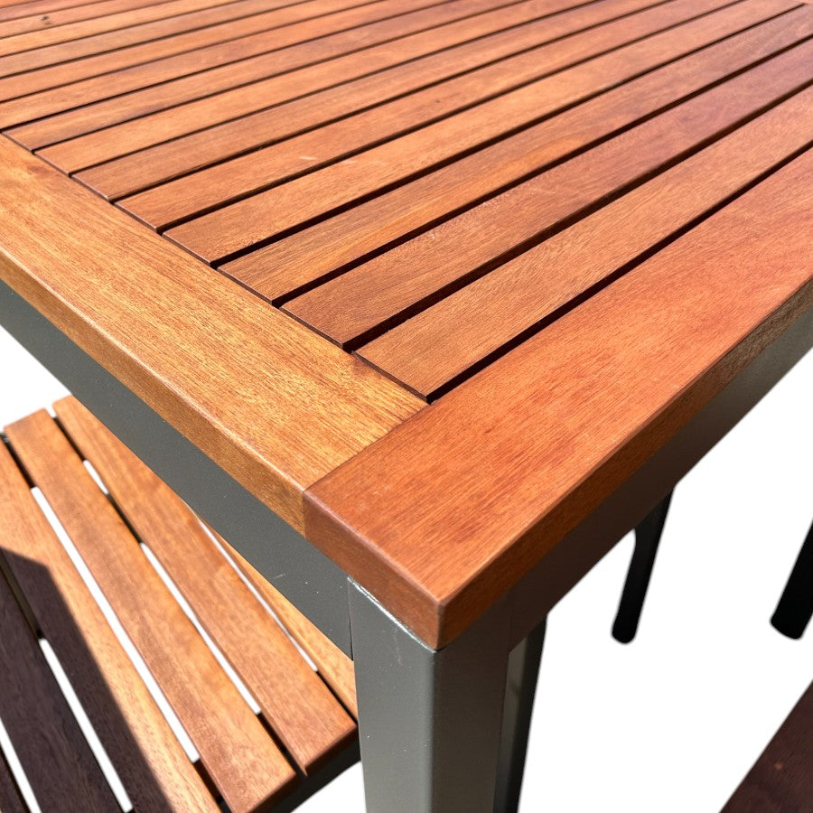 a close-up on the corder of an outdoor dining table