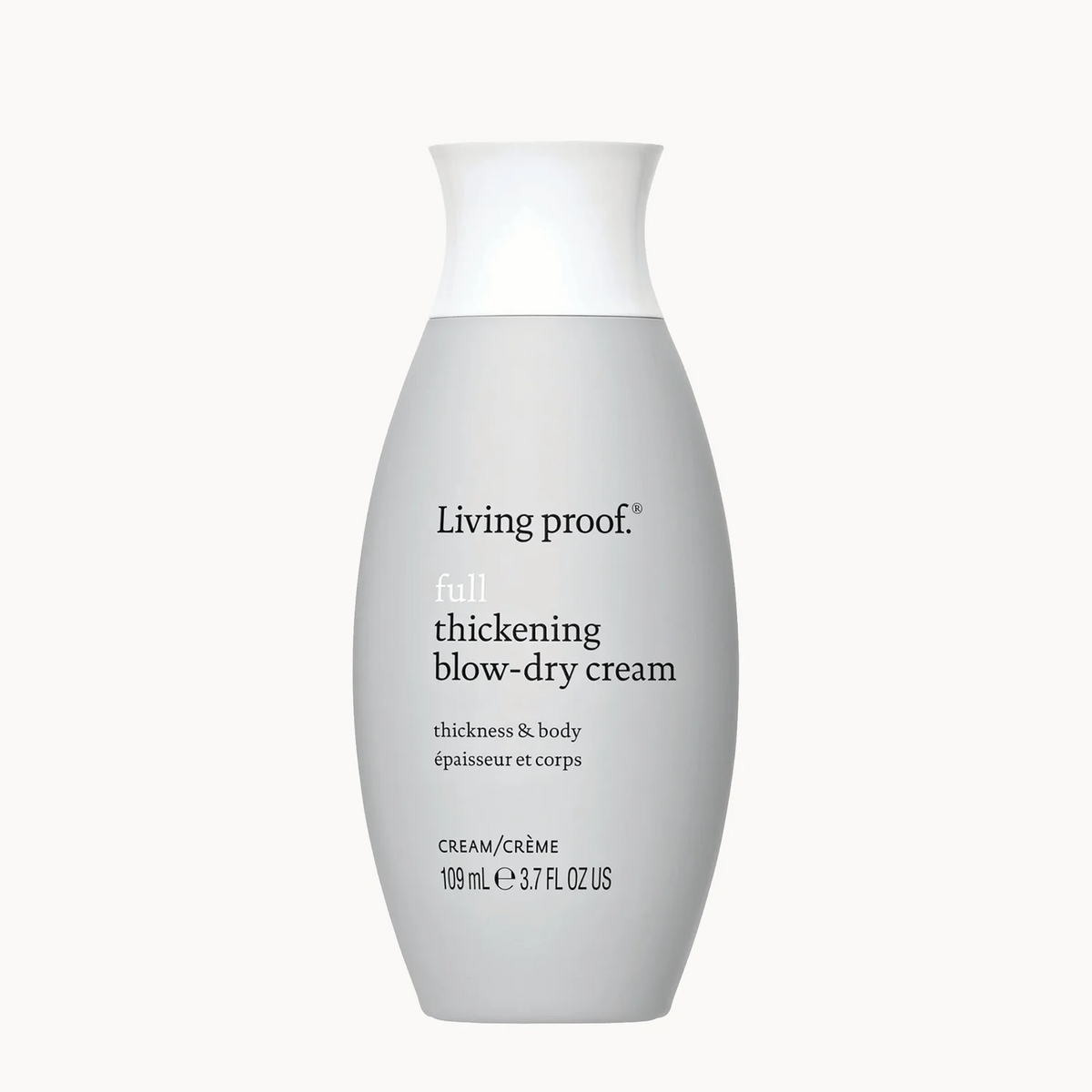 A 100ml bottle of Living proof Full Thickening Blow-Dry Cream in a light gray color, shown against a plain white background.