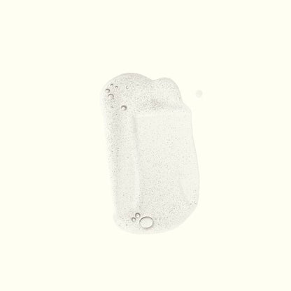 Aesop soap foam with small bubble details, centered on a solid off-white background.