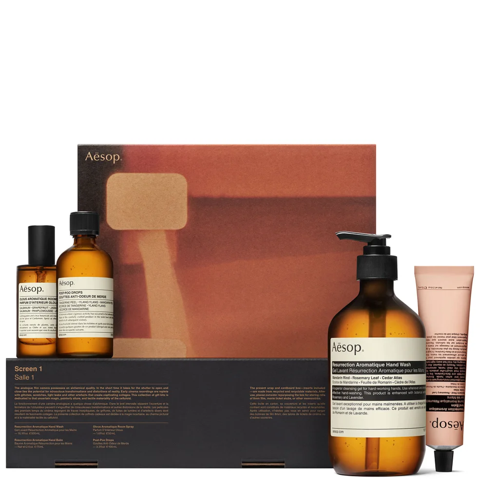 Aesop product set with bottles and a box on a white background