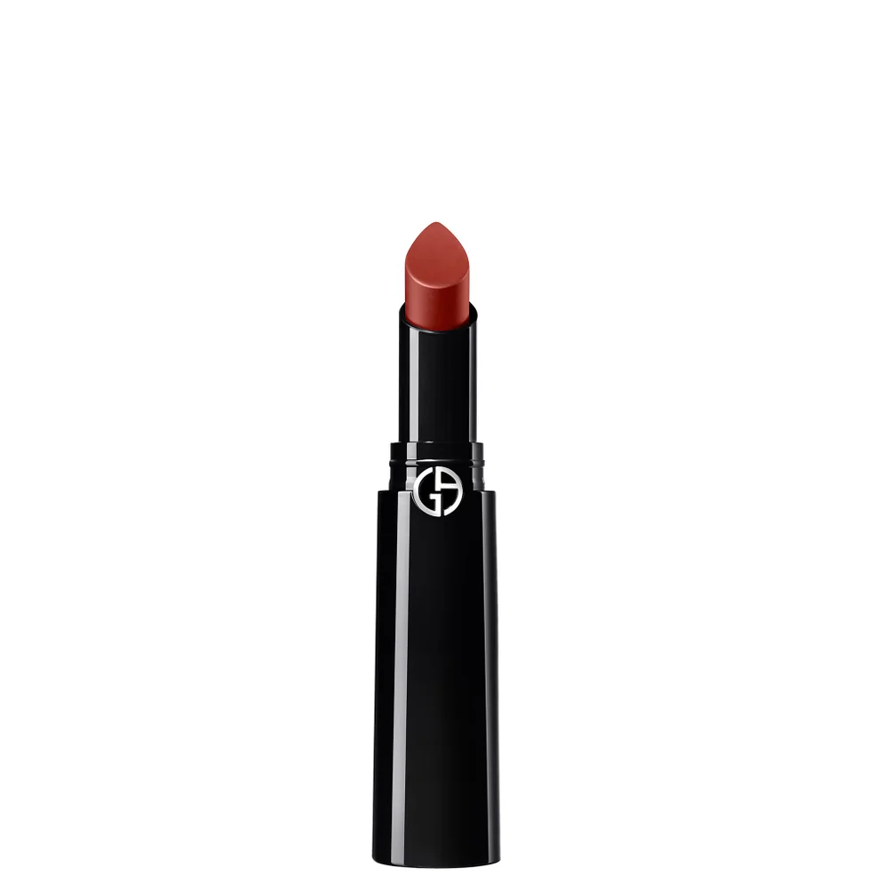 A single tube of lipstick with a black casing and a warm reddish-brown lipstick bullet, shown against a plain white background. The brand logo is visible on the tube.