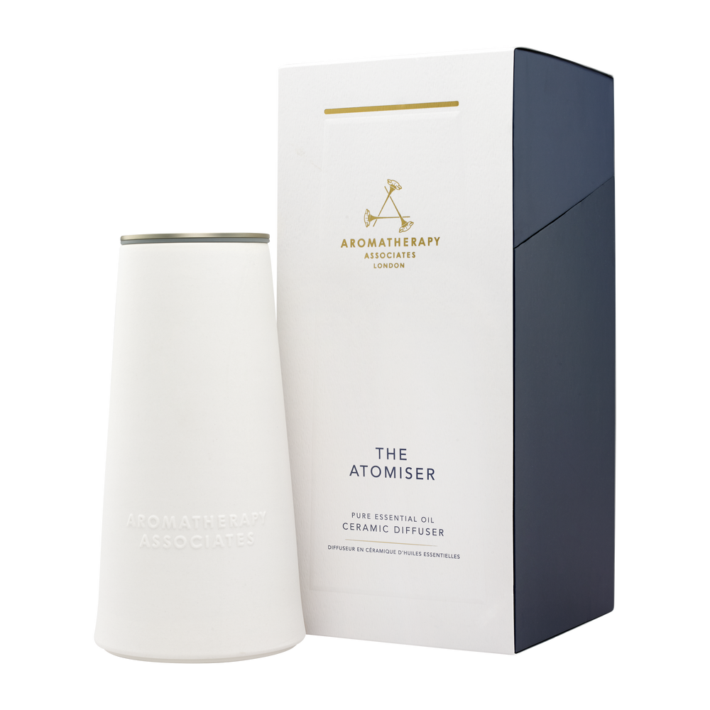 White ceramic diffuser with black packaging featuring 'Aromatherapy Associates' branding on a white background.