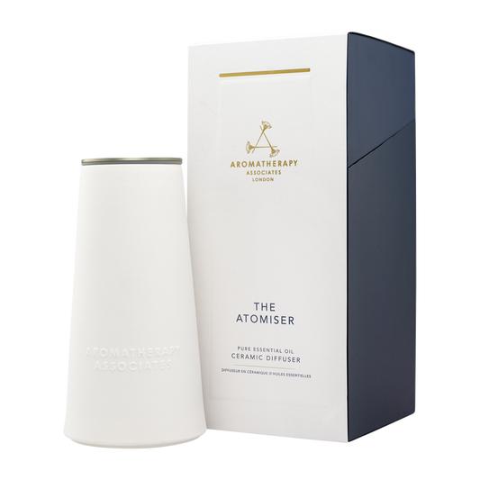 White ceramic diffuser with black packaging featuring 'Aromatherapy Associates' branding on a white background.