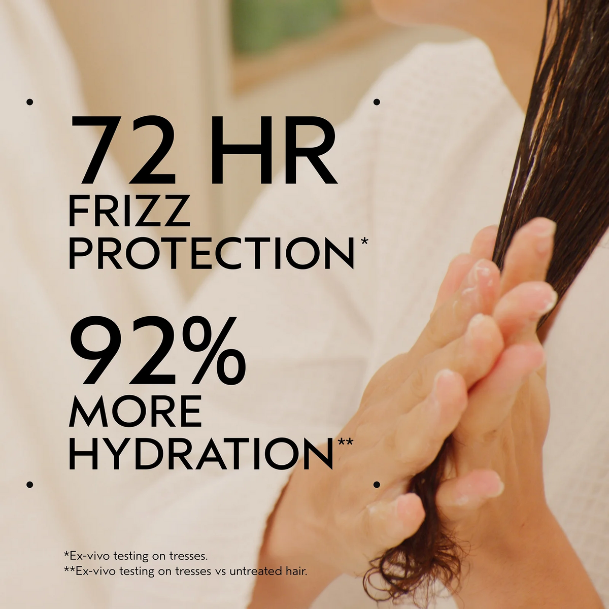 Person holding hair with text about 72-hour frizz protection and 92% more hydration.