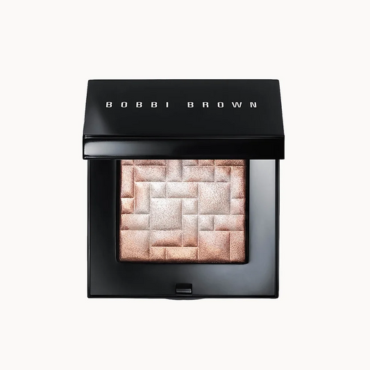 Bobbi Brown eyeshadow compact in a black square case, shown open with a single shimmering rectangular pan of warm champagne and rose gold shadow on a light gray background.