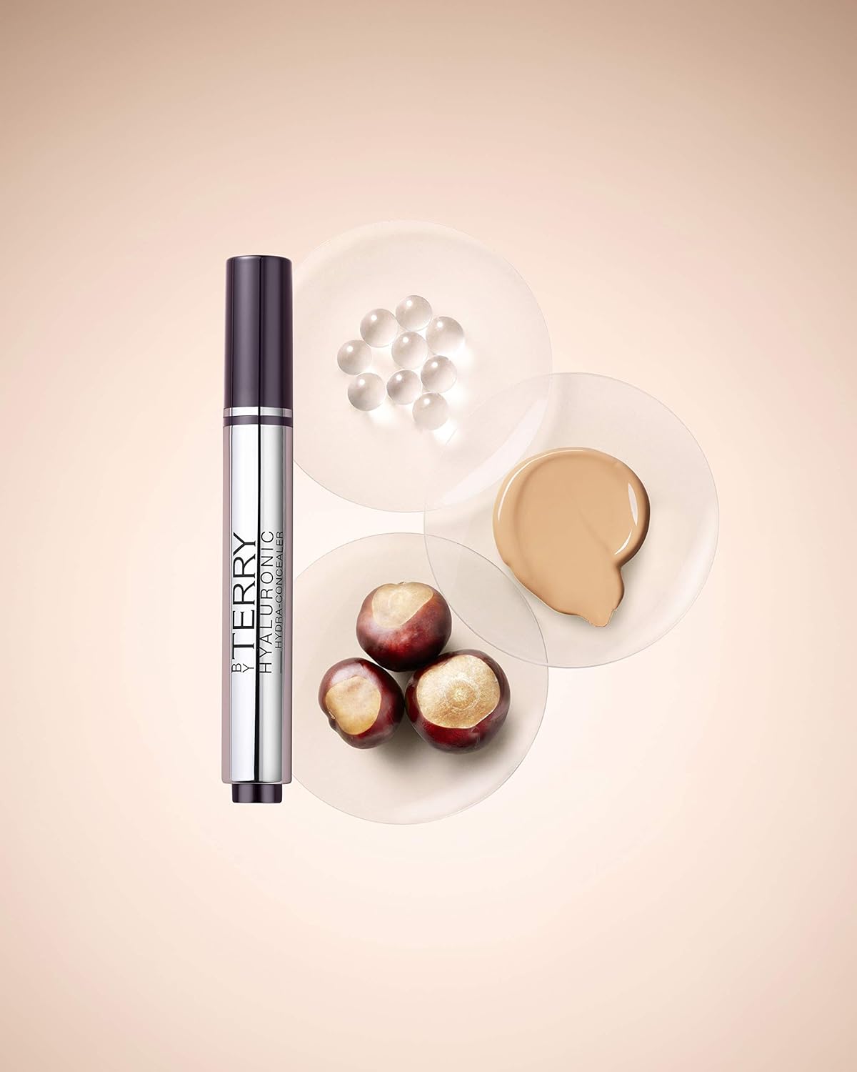 concealer with 'by Terry' branding on a beige background