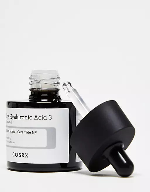 Cosrx skincare product with dropper on a white background