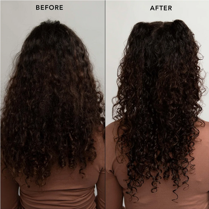 A side-by-side before and after comparison showing the back view of a person with long, dark, curly hair. The left panel is labeled 'BEFORE' and shows the hair in a less defined, frizzy state.