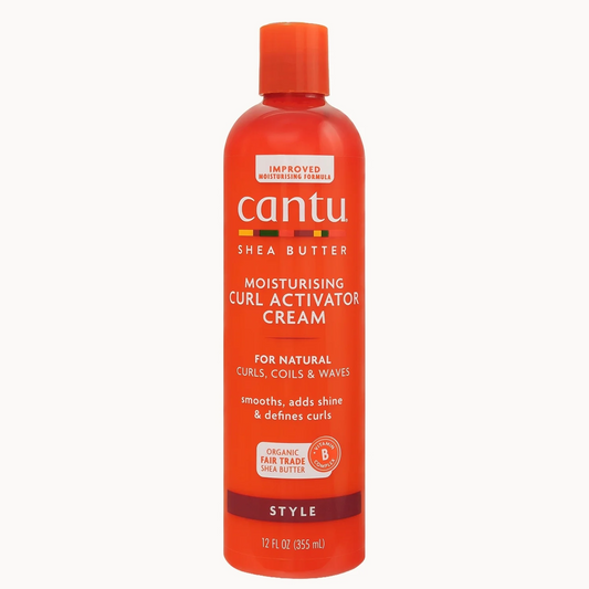 A bottle of Cantu Shea Butter Moisturising Curl Activator Cream in a vibrant orange-red color, shown against a plain light gray background.