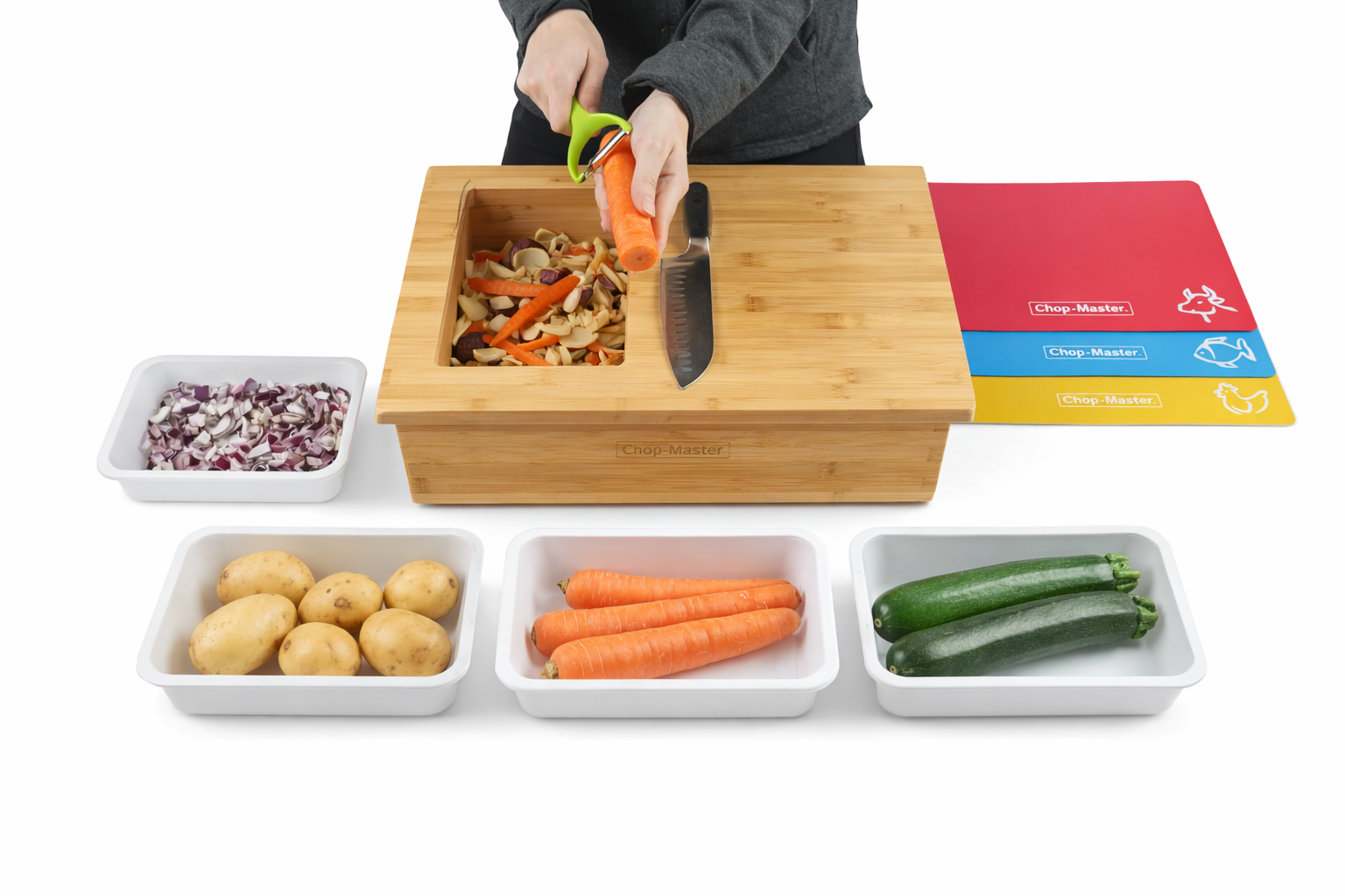 Person using a wooden vegetable sorting tray with compartments for different vegetables on a white background.