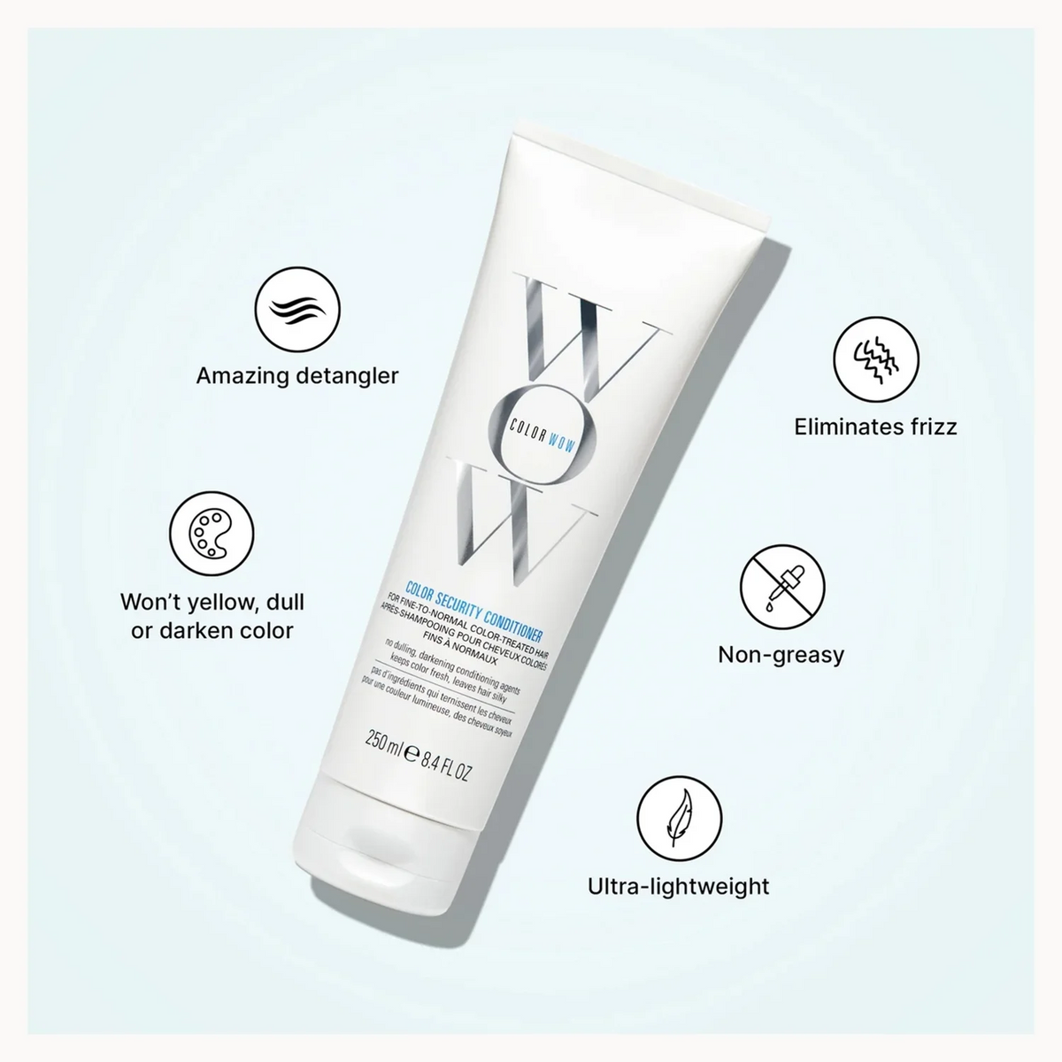 A white tube of hair conditioner is shown on a pale blue background with feature icons and text around it, including 'Amazing detangler,' 'Eliminates frizz,' 'Won't yellow, dull or darken color,' 'Non-greasy,' and 'Ultra-lightweight.'.