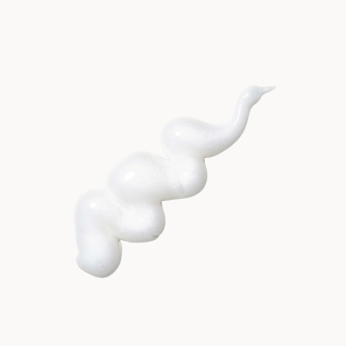 White cream or shampoo lather on a white background