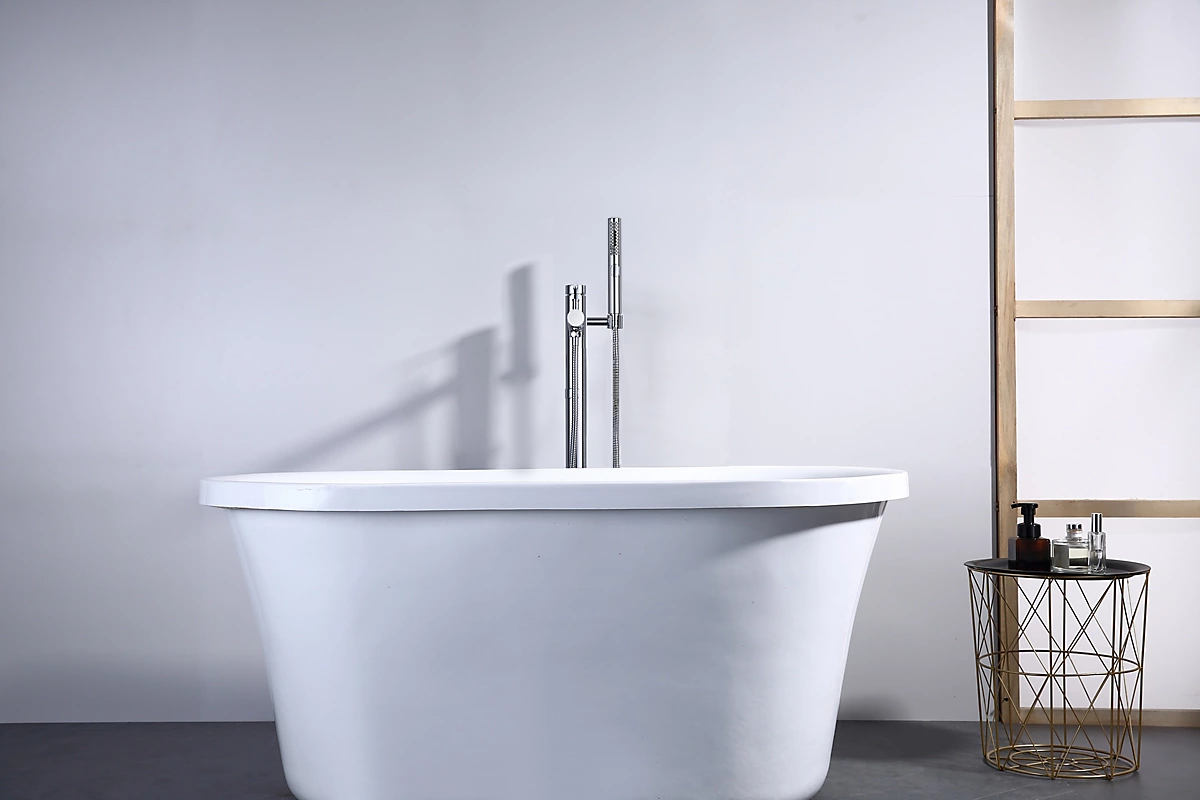 Modern freestanding bathtub in a bathroom with a ladder against the wall.