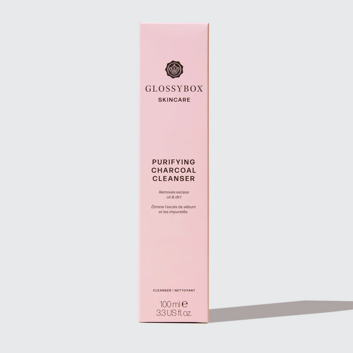 a pink box of Glossybox - Purifying Charcoal Cleanser