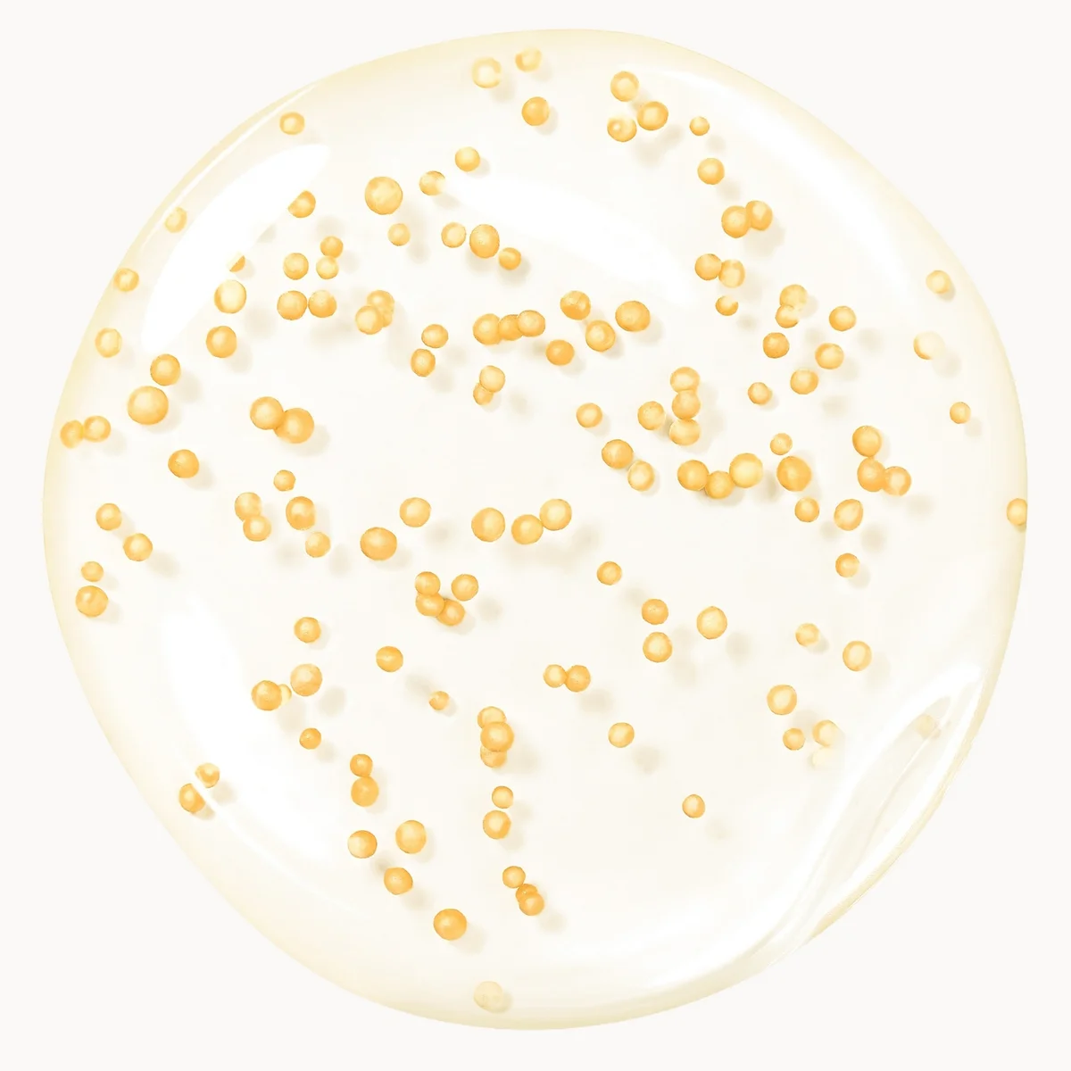 Clear gel with gold beads on a white background
