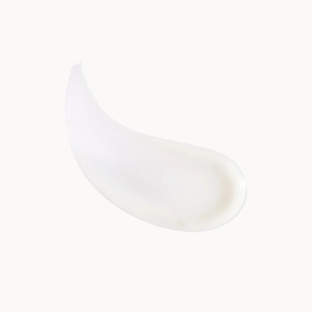 White cream sample smeared on a white background