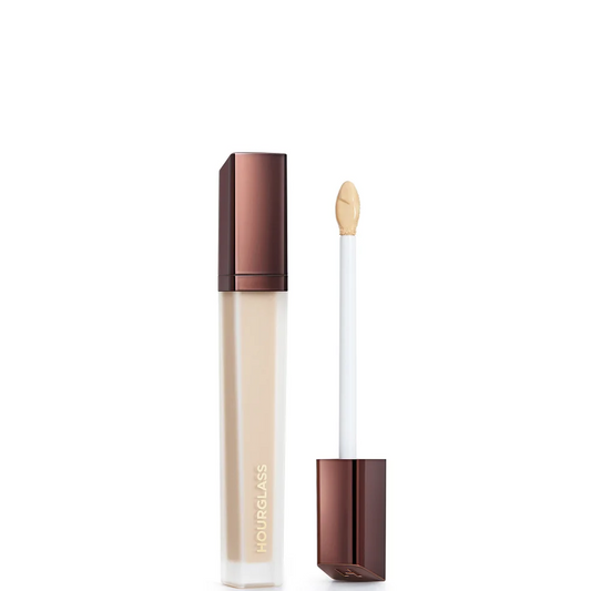 Hourglass concealer with applicator on a white background
