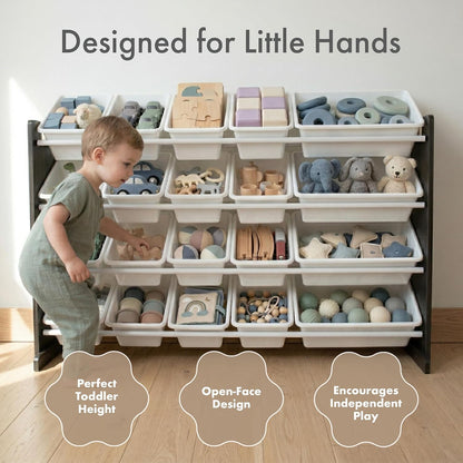 A toddler stands beside a freestanding open-bin toy organizer filled with wooden blocks, balls, stuffed animals, and puzzle pieces. Large text at the top reads 'Designed for Little Hands,' with three callout shapes at the bottom highlighting features like perfect toddler height, open-face design, and encouragement of independent play.