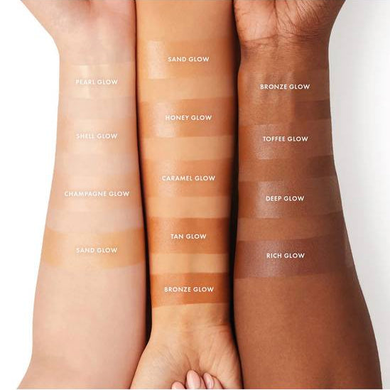 Three arms with different colored makeup swatches labeled from 'Frost Glow' to 'Bronze Glow'.