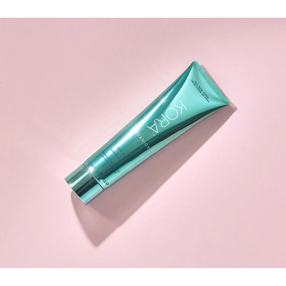 Kora Organics tube on a pink background