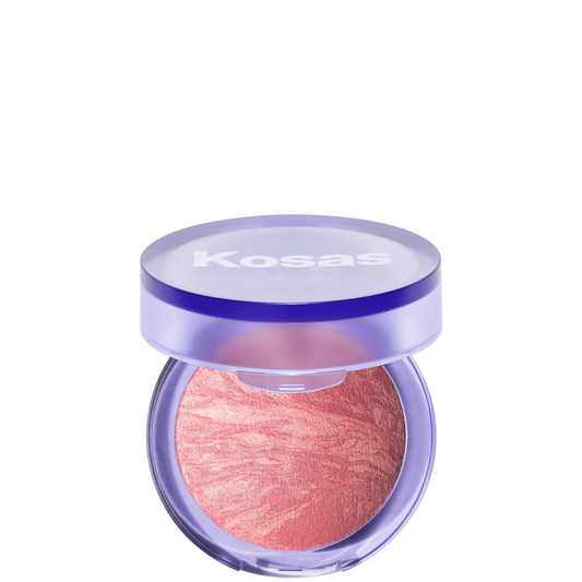 Kosas round blush compact with a translucent lavender lid and a shimmering pink-rose pressed powder visible inside, shown on a plain white background.