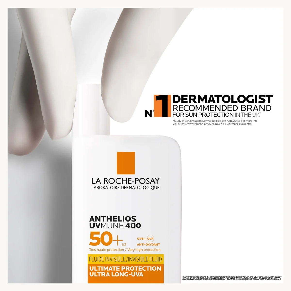 La Roche-Posay Anthelios UVMune 400 SPF 50+ fluid sunscreen bottle shown against a white background with a close-up of white gloves and a dermatologist recommended brand badge.
