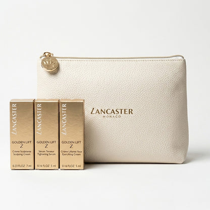 Lancaster beauty products including cream and serum with a beige pouch on a white background