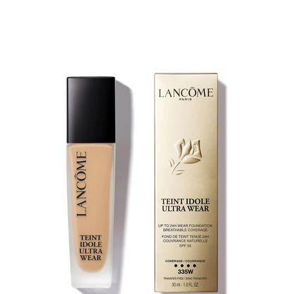 Lancôme Teint Idole Ultra Wear foundation in a clear bottle showing the beige liquid, next to its beige packaging box on a white background.
