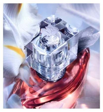 Perfume bottle with a floral background