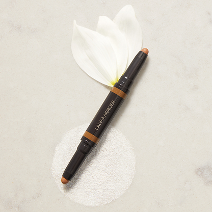 Laura Mercier makeup pencil on a light gray background