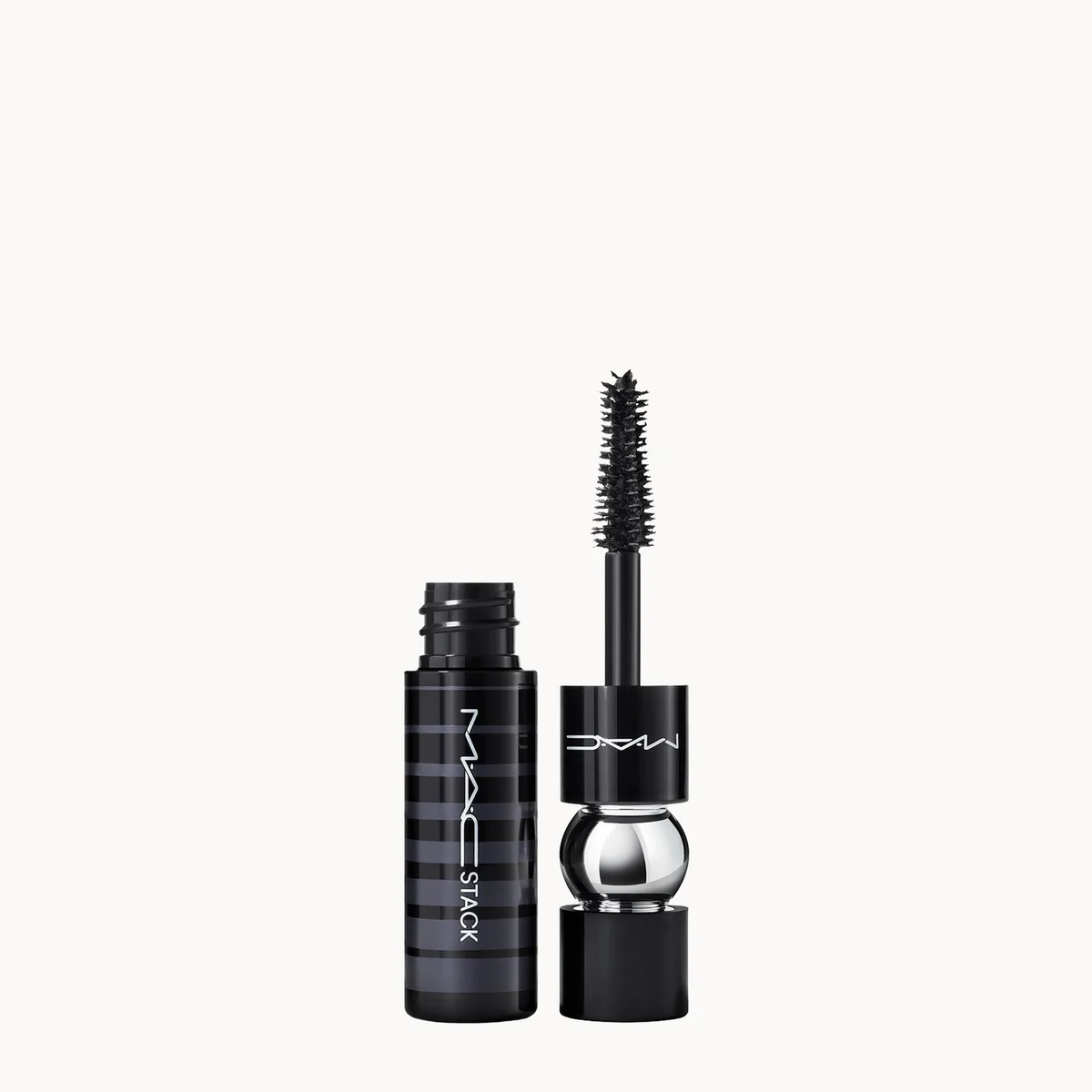 MAC Black Stack mascara shown with the black cap removed and the wand standing beside it on a clean white background.