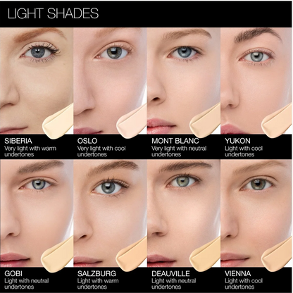 A shade chart labeled 'LIGHT SHADES' showing eight square skin-tone swatches arranged in a grid, each with a model's eye and cheek area above it and shade names including Siberia, Oslo, Mont Blanc, Yukon, Gobi, Salzburg, Deauville, and Vienna.