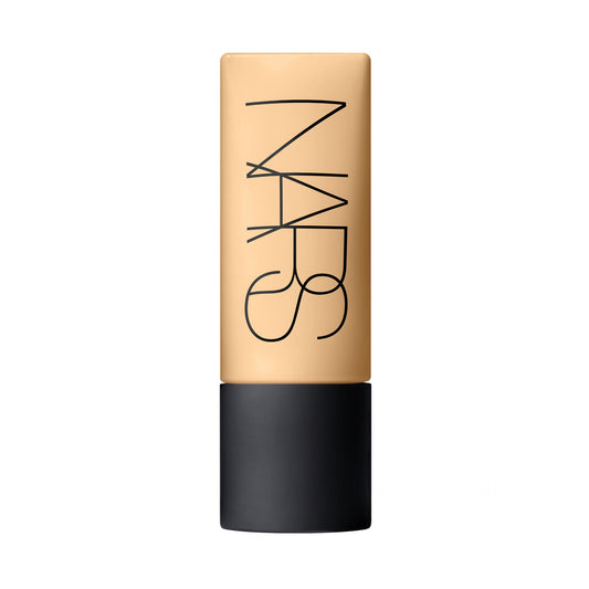 NARS liquid foundation in a rectangular squeeze tube with a warm beige shade and a black cap, featuring the NARS logo in black on the front, set against a solid white background.