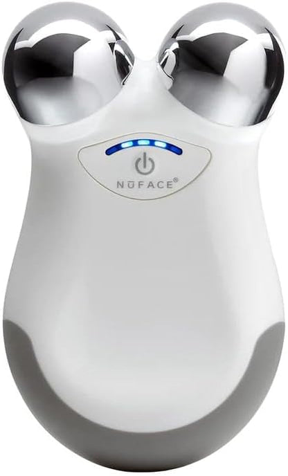 Nuface facial toning device on a white background