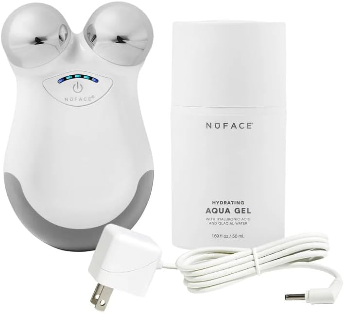 Nuface facial device with packaging and cable on a white background