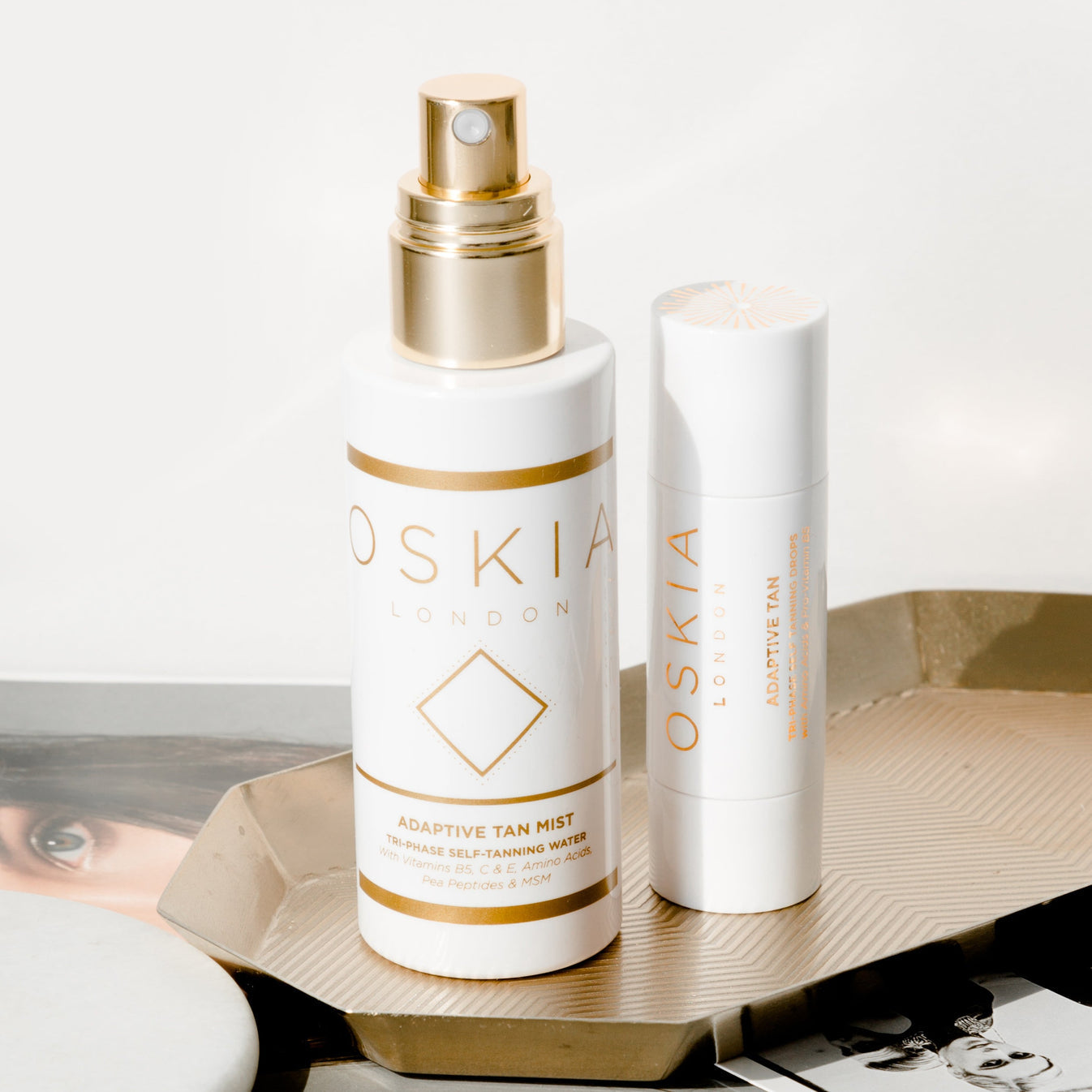 Oskia skincare products on a tray with a magazine in the background