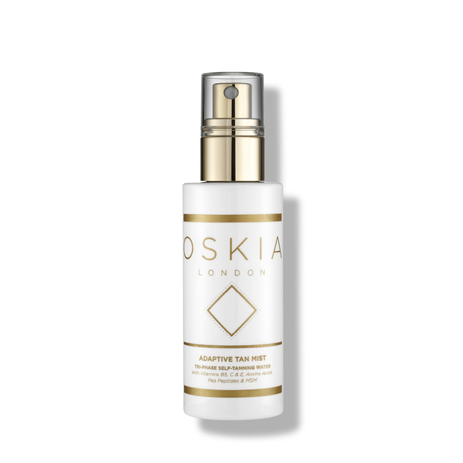 Oskia Adaptive Tan Mist bottle on a white background