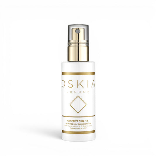 Oskia Adaptive Tan Mist bottle on a white background