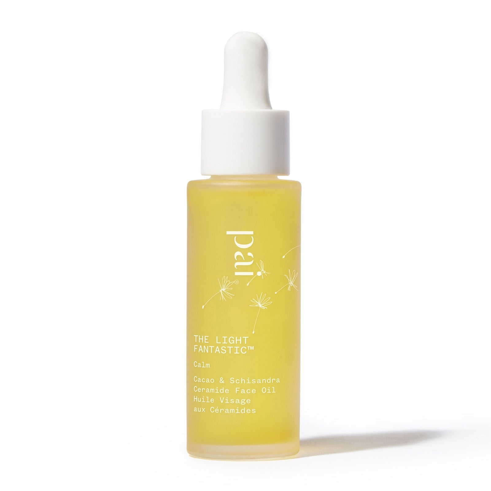 Yellow bottle of Pai skincare product with a dropper on a white background