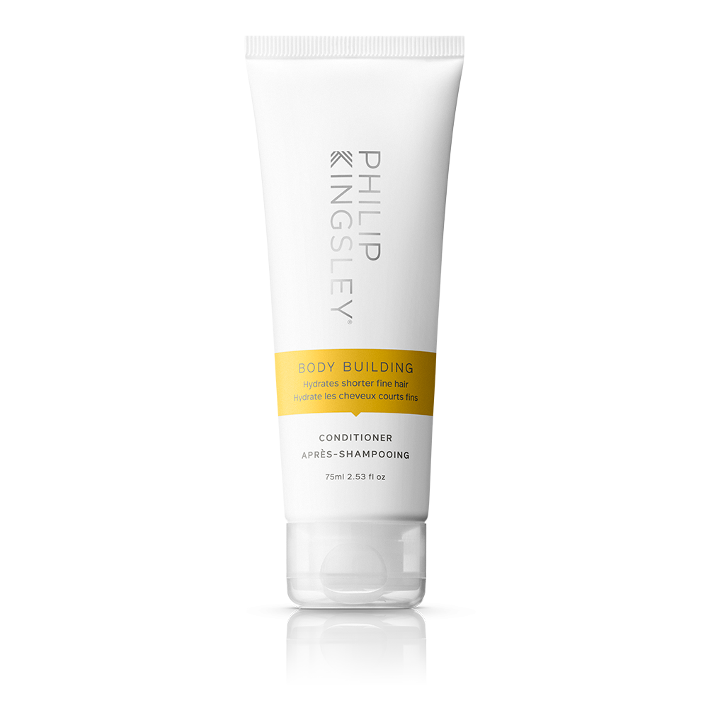 Tube of Philip Kingsley Body Building Conditioner on a white background