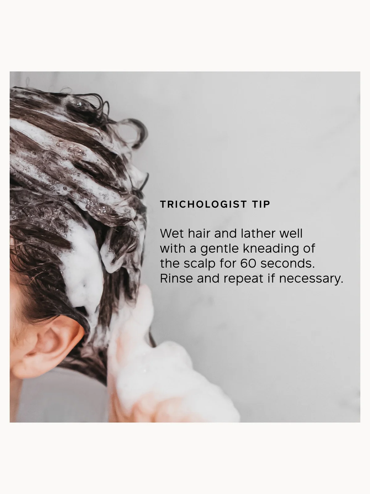 Person washing hair with a trichologist tip on a gray background