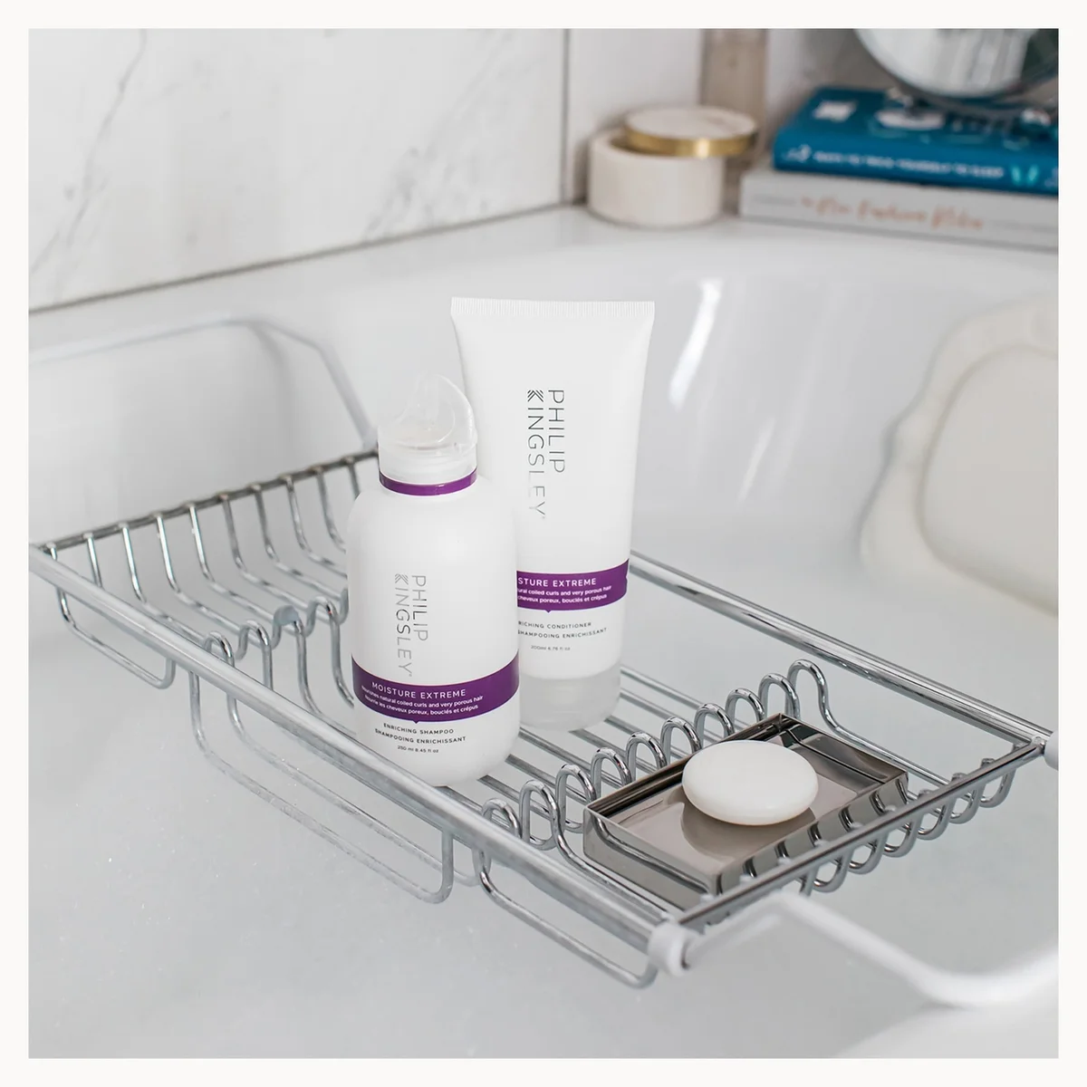 Bathroom shelf with skincare products on a white tiled wall