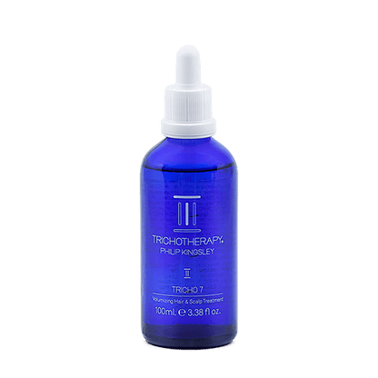 Blue bottle with white dropper labeled 'Tricho7' on a transparent background