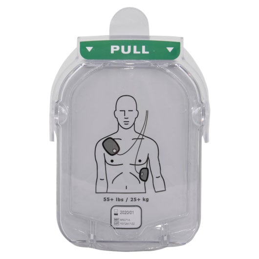 AED (Automated External Defibrillator) device packaging with clear lid showing a diagram of chest electrodes.