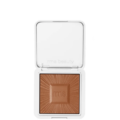 RMS Beauty bronzer in a compact on a white background