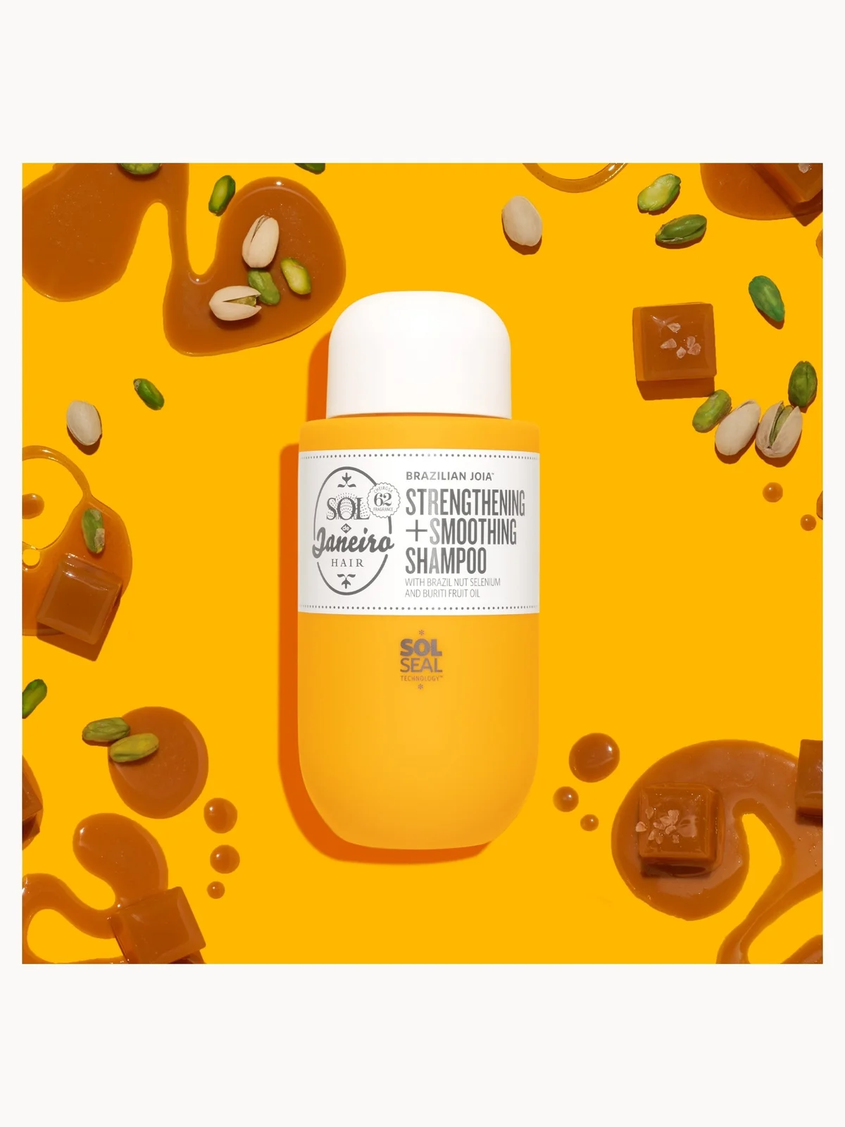 Shampoo bottle with a label on a yellow background with abstract designs and seeds.