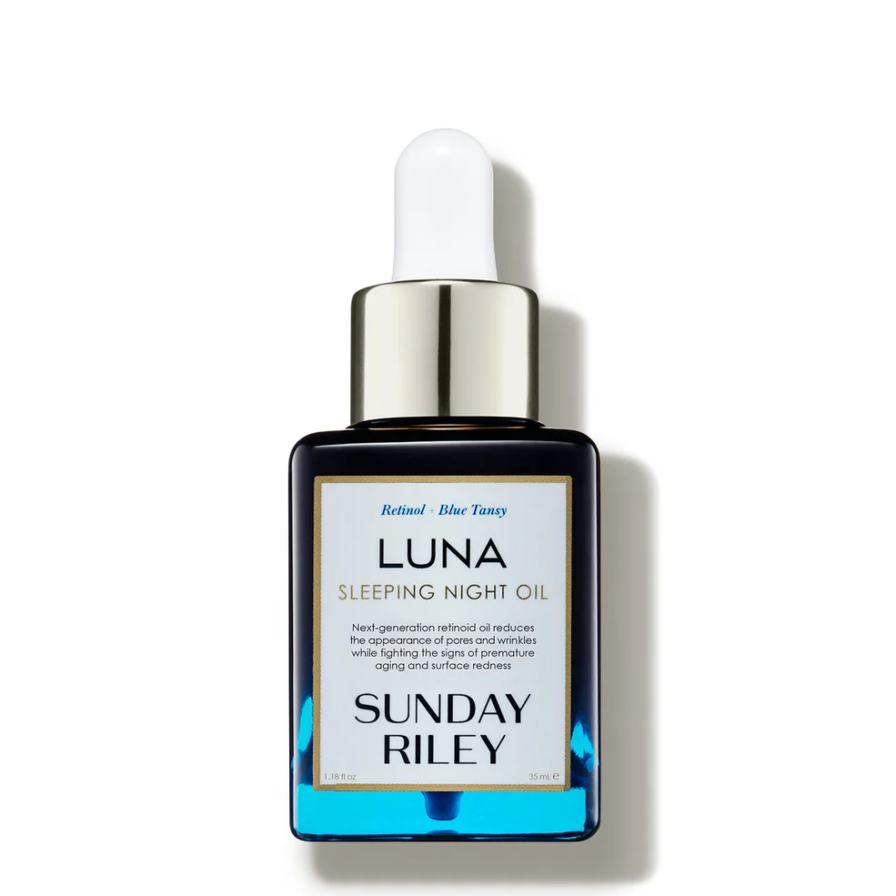Sunday Riley Luna Sleeping Night Oil in a dark blue glass dropper bottle with a metallic silver collar and a white dropper cap, set against a plain white background.