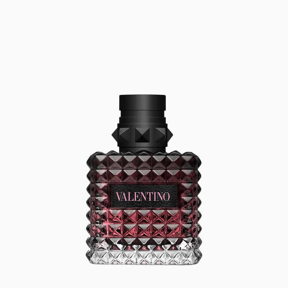 VValentino Born in Roma Donna Intense Eau de Parfum for Her 30ml fragrance bottle with a faceted dark red and black textured glass body, black cap, and a black label with the brand name 'VALENTINO' in pink, centered on a light gray background.
