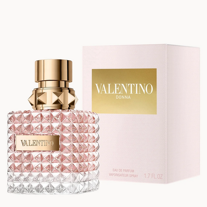 Valentino Donna Eau de Parfum bottle with a textured pink and clear diamond-patterned glass body and a gold cap, shown next to its light pink and gold box.
