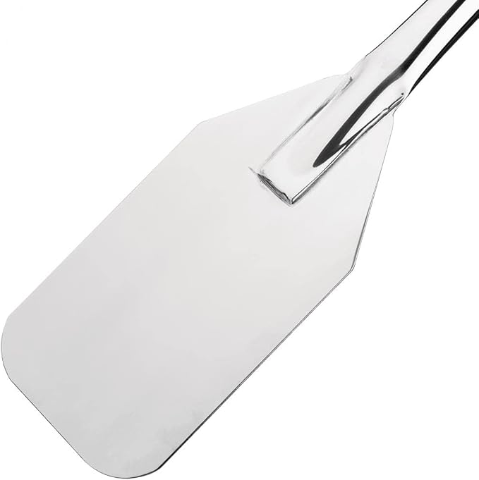 Metal spatula on a white background